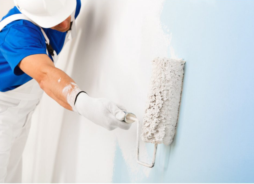 peintre entrain de faire de la peinture